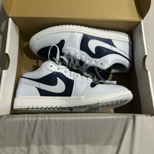 Nike women’s White and Blue Sneakers